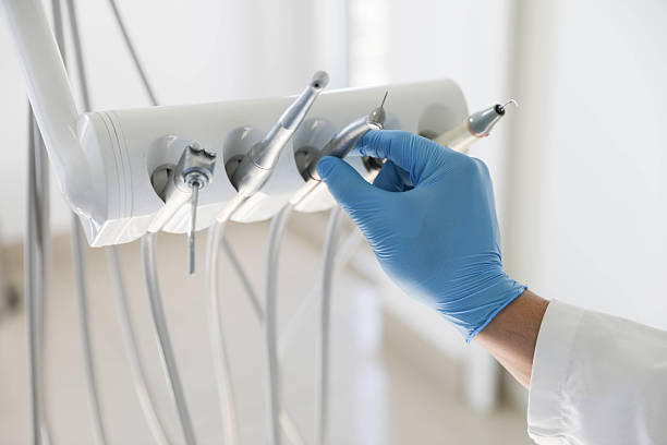 Professional Root Canal Treatment technician working in Greenville, VA